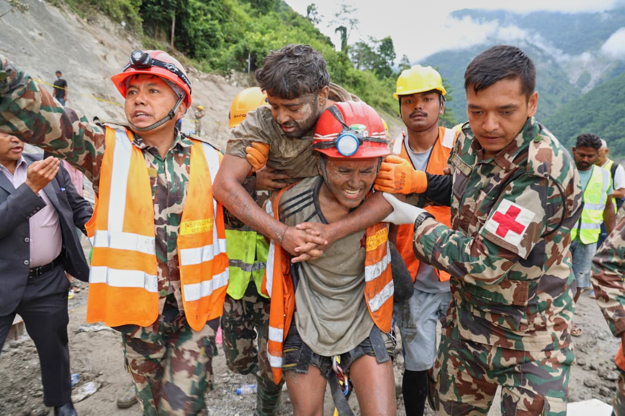 Rescuers pull trapped workers from a hydropower tunnel 9 days after Nepal floods